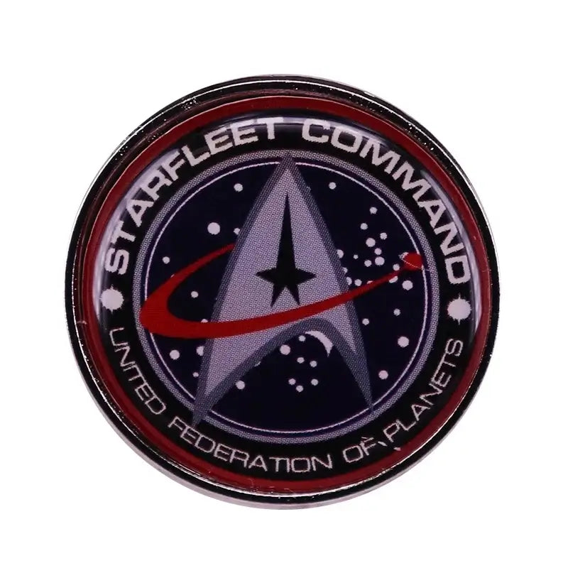 Starfleet Command enamel pin featuring the United Federation of Planets logo, perfect for collectors and fashion enthusiasts.