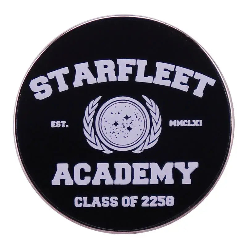 Starfleet Academy enamel pin with black background and white text for trendy fashion accessories.