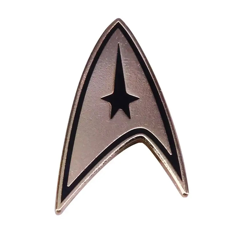 ST-Star Trek enamel pin featuring iconic starship insignia, perfect for backpacks and fashion accessories.