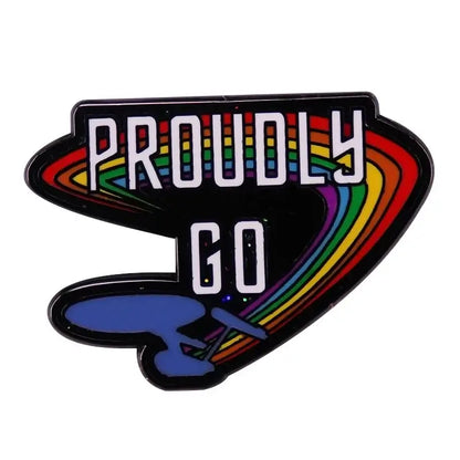 ST-Star X Trek enamel pin with rainbow design and 'PROUDLY GO' text, perfect for backpacks and jackets