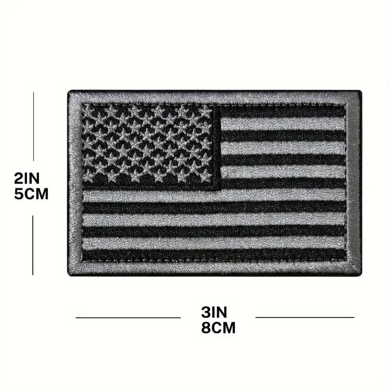 Black and gray USA flag embroidered patch, measuring 8cm x 5cm, designed for hats and jackets.